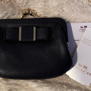 Coach Navy Textured Leather Coun purse.